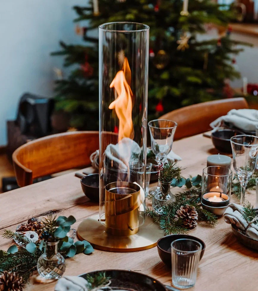 Cheminée de table Höfats avec flamme tourbillonnante dans un cylindre en verre