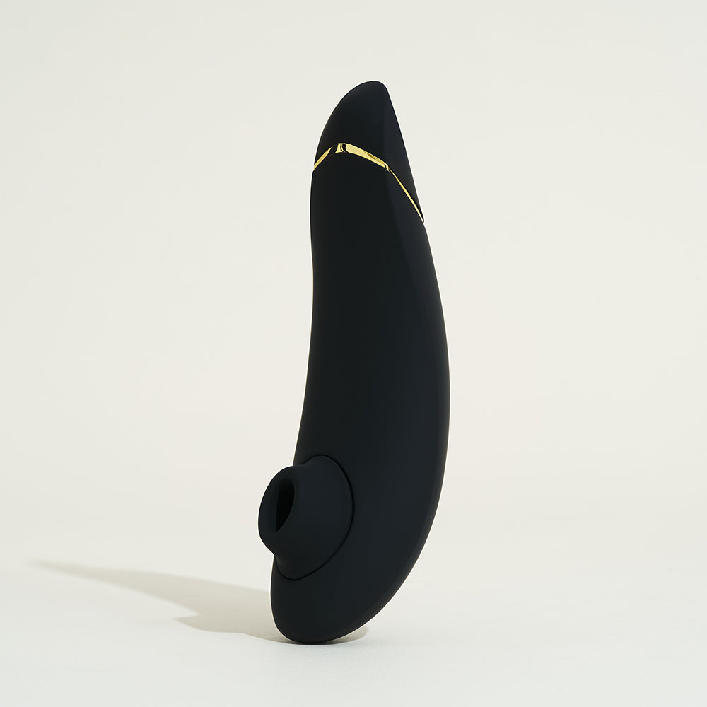 Womanizer Premium 2 reconditionné noir, de profil