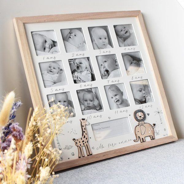 Cadre en bois Ma première année avec douze photos de bébé, une girafe et un lion en bois découpé