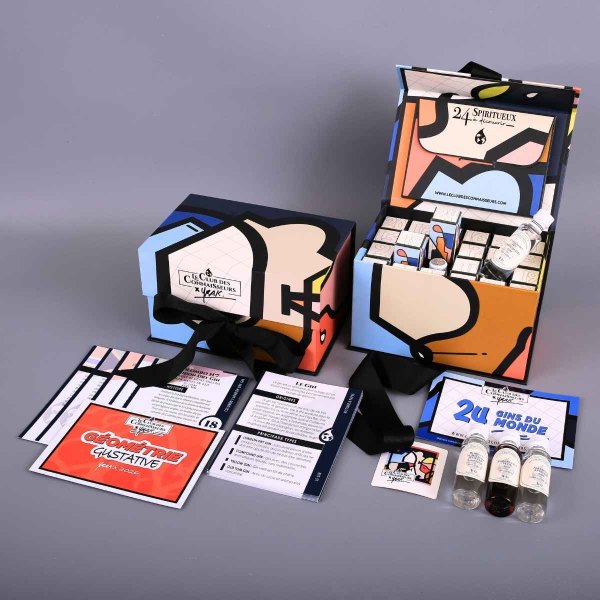Calendrier de l'Avent gin 2026 du Club des Connaisseurs, coffret graphique de l'artiste Yrak et fiches de dégustation
