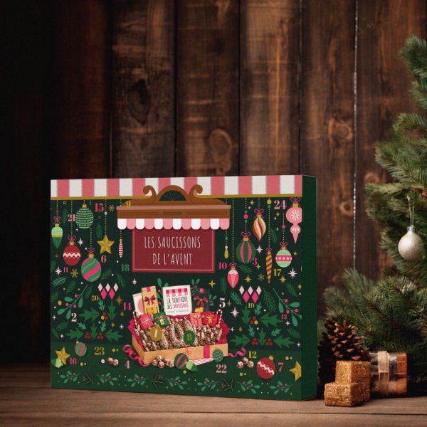 Calendrier de l'Avent des saucissons artisanaux, coffret vert et rouge en forme de boutique de charcutier