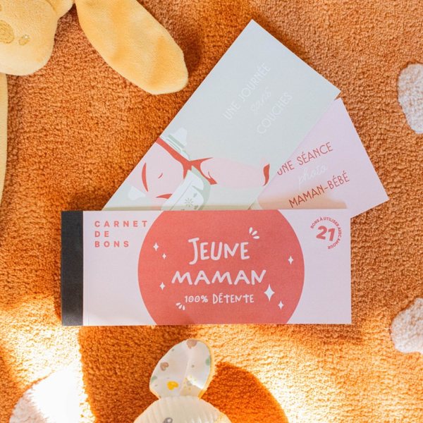 Carnet de bons Jeune maman 100 % détente avec des bons détachables illustrés posés sur un tapis