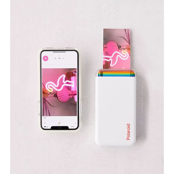 Imprimante photo Polaroid Hi-Print blanche et ses tirages