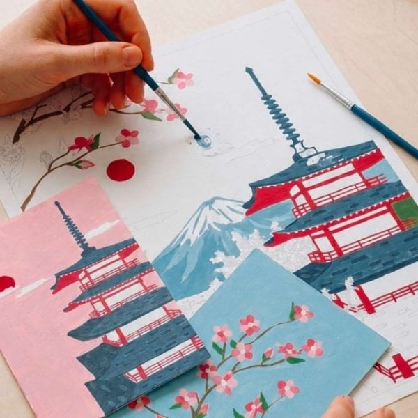 Peinture au numéro en cours avec godets et pinceau