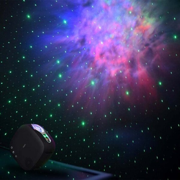 Projecteur Galaxie noir diffusant une nébuleuse violette et des étoiles vertes au plafond