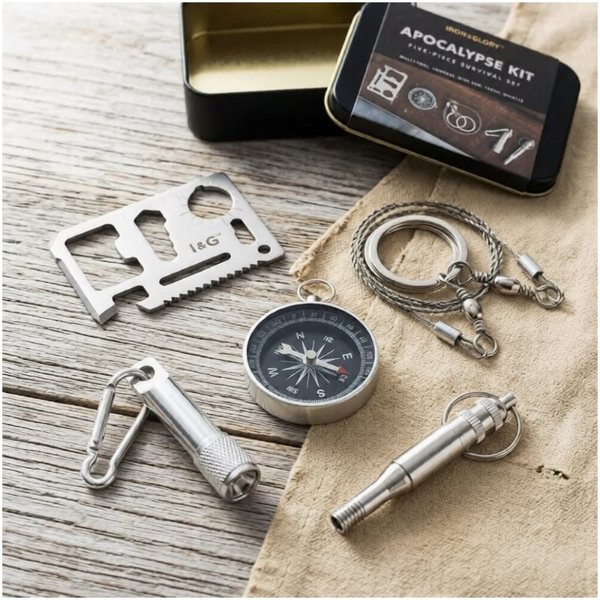 Boîte métal Apocalypse Kit ouverte avec multi-outil carte, boussole, scie, lampe et sifflet