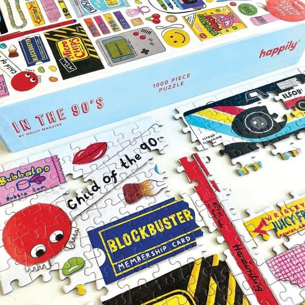 Puzzle 1000 pièces illustré des icônes des années 90 avec cassettes et Blockbuster